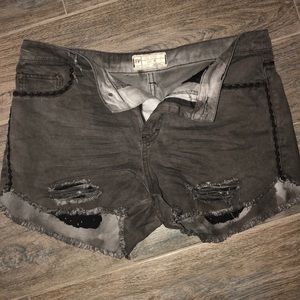 Free People ripped shorts with black trim